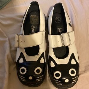 Black and white cat shoes.